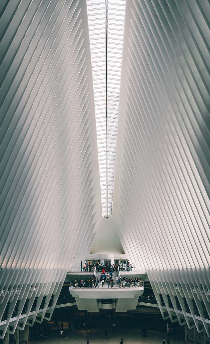 new york people in white concrete building the oculus